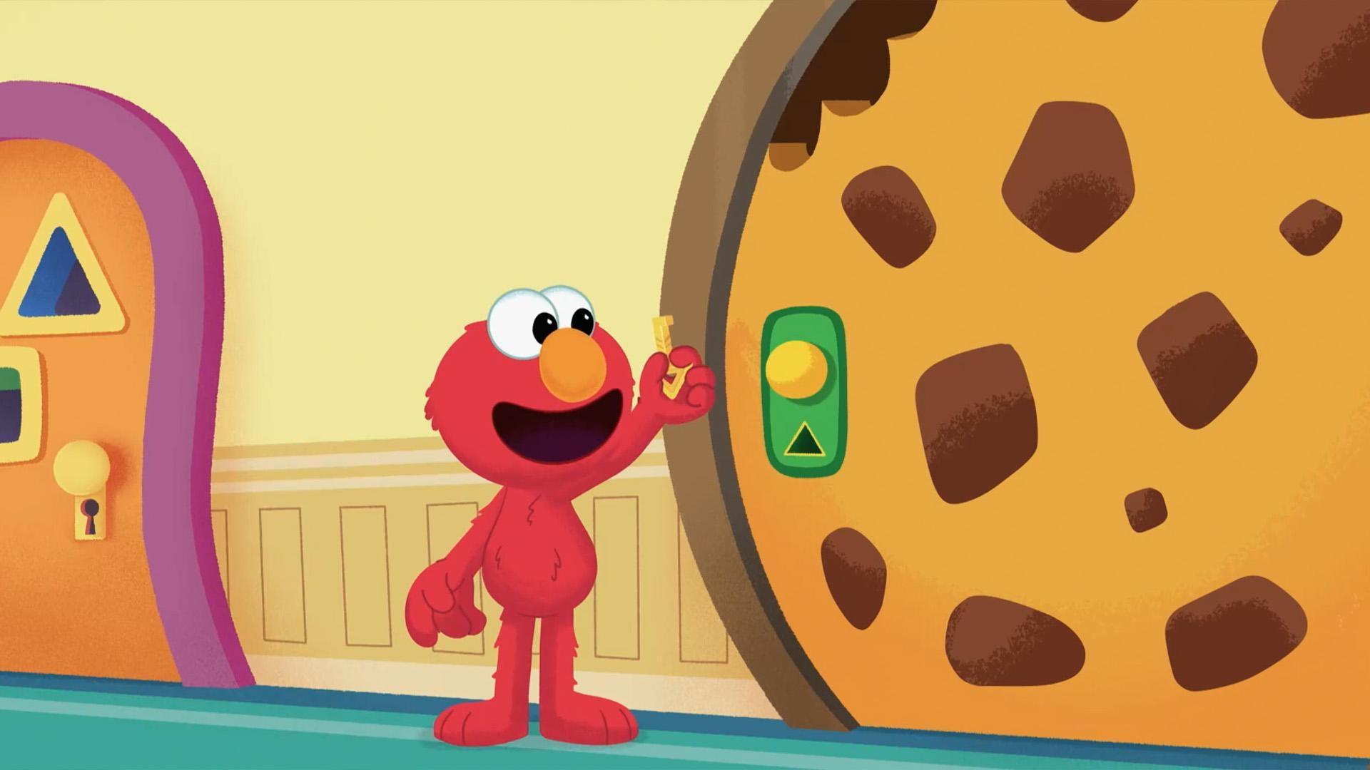 Elmo steps in to help Cookie Monster find the key to open his door.