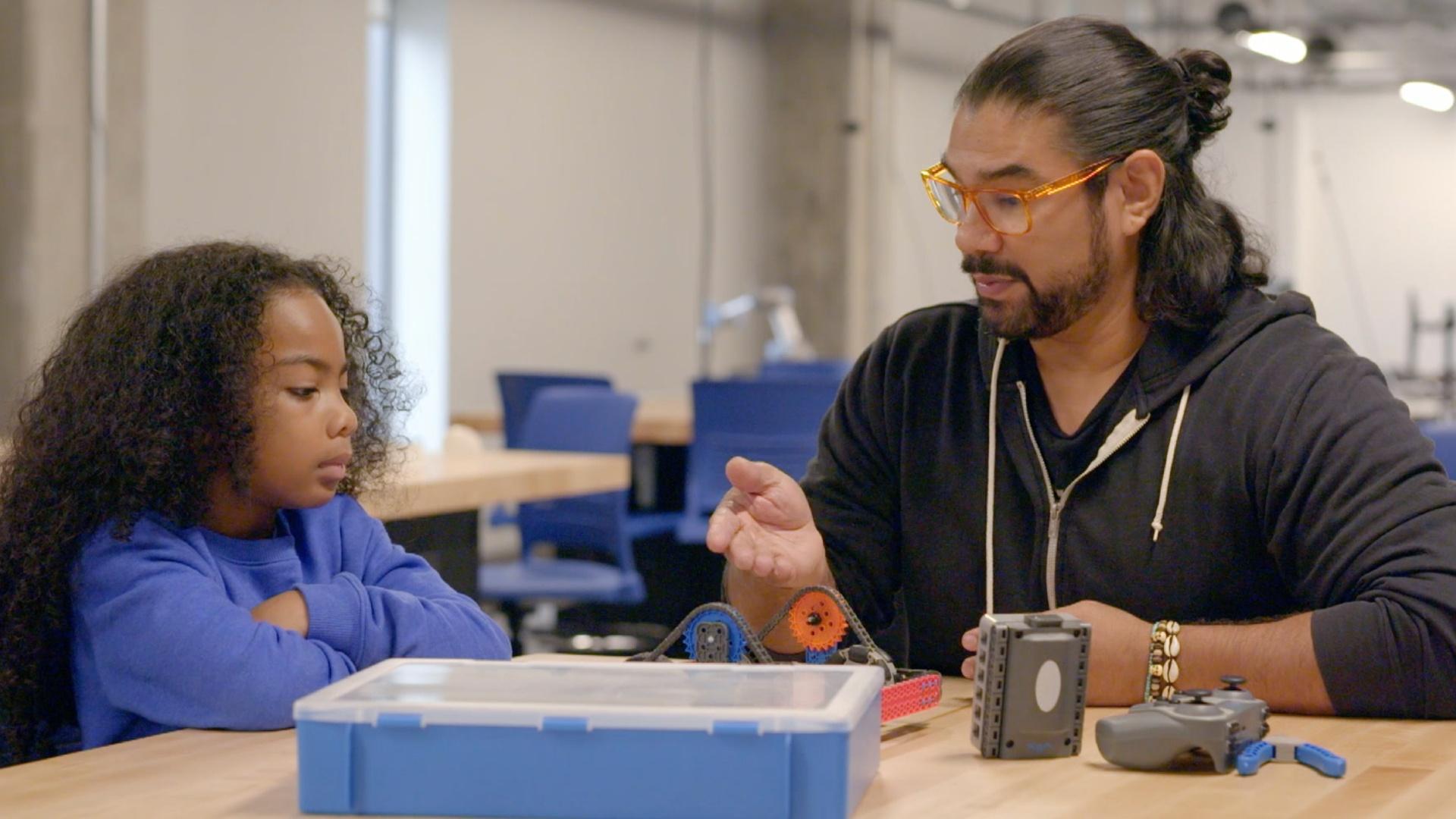 Ryan, a robotics instructor, helps Tony build a robot. Tony learns about Ryan’s job.