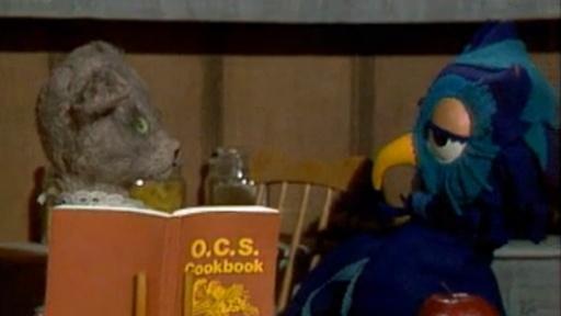 Preparing food in a restaurant; X the Owl's bossiness angers Henrietta.